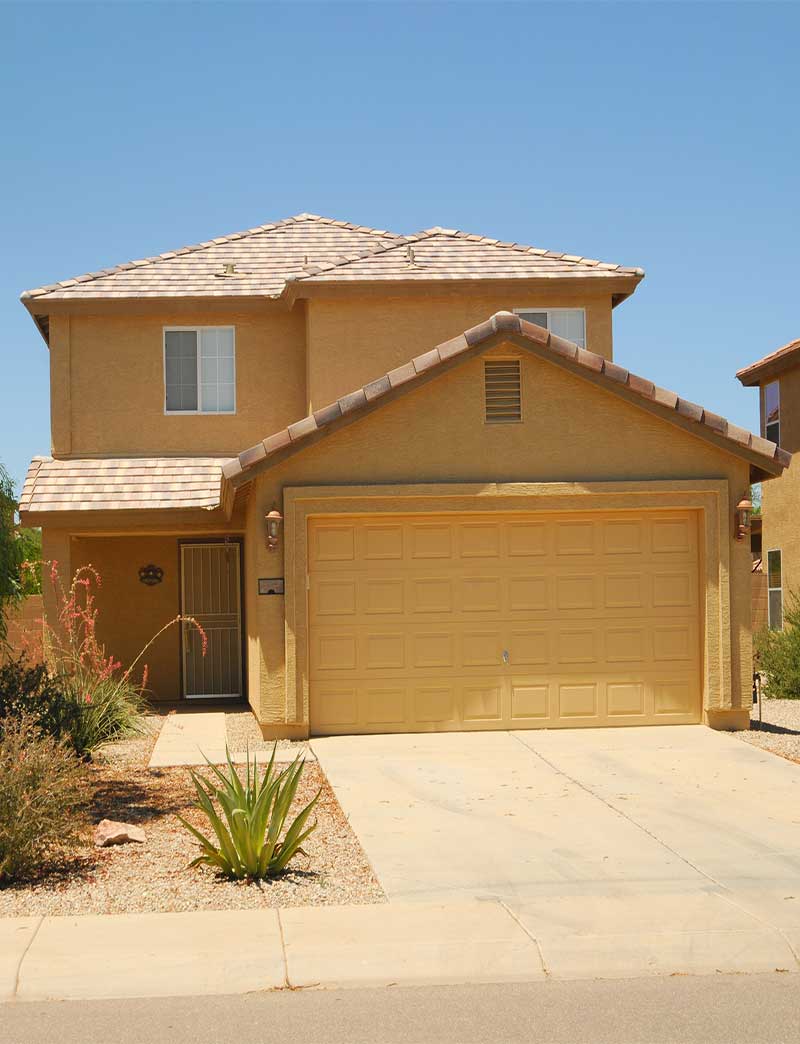 Two-story stucco home in Arizona featured for a new-construction or 11-month warranty inspection.
